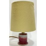 John Maguire for Strathearn Pottery, a sang de boef glazed lamp with khaki linen/canvass shade (heig