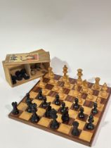 A walnut and ash chess board, ( L x 32 cm sq) and a pine box containing a set of ebony stained and