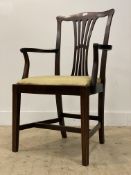 A Georgian style mahogany elbow chair, early 20th century, with slat back over drop in upholstered