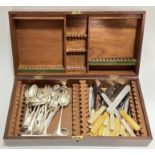 A canteen of silver plated and Sheffield steel cutlery comprising a large quantity of butter knives