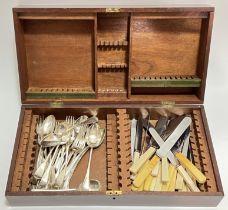 A canteen of silver plated and Sheffield steel cutlery comprising a large quantity of butter knives