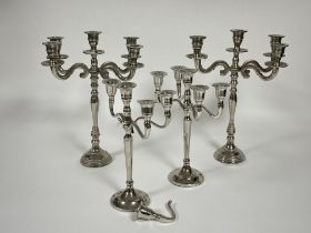 A pair of plated five branch candelabra on tapered baluster columns and circular bases, (H x 36