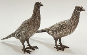 A pair of miniature cast white metal table pheasants (male and female) (h- 8.5cm)