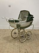 A Vintage Silver cross pram in white and green livery. L100cm.