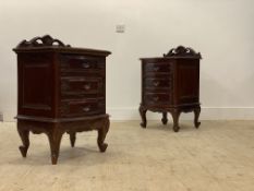 A pair of hardwood bedside chests of 18th century inspiration, each fitted with three drawers having