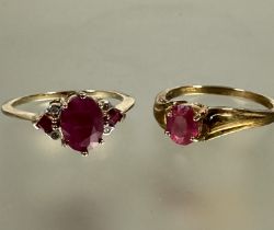 A 9ct gold solitaire ring set pink oval ruby mounted in four claw setting O approximately 0.30ct and