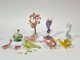 A collection of various Murano Glass fish comprising, a  blue Dolphin ewer (h-15.5cm), two pink, one