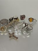A collection of white metal and silver jewellery including five various rings, silver circular