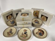 A collection of Hummel potter year plaques, ten boxed various years 1980-1992 and seventeen