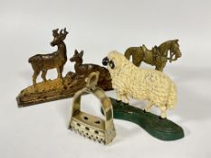 A 19thc cast iron stag and hind distressed finished door stop H x 18cm L x 32cm , a modern cast iron