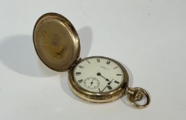 A gold gilt metal 1920's working Waltham full hunter pocket watch, with roman numerals and white
