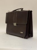Pierre Cardin, a Vintage brown stitched leather briefcase, with carry handle and combination