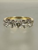 A 18ct gold five stone brilliant cut diamond claw set ring N total weight of diamonds 1ct 5.07g