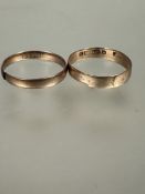 Two 9ct gold wedding bands cut 2.46g (2)
