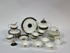A Royal Doulton Carlyle pattern part tea service comprising, one serving dish (w-26cm), one milk jug