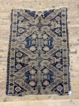 A hand knotted Turkish rug of all-over Geometric design 154cm x 106cm
