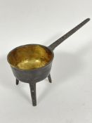 A 18thc Bayley & Street patinated cast bronze cooking/ apothecary pot raised on tripod tapered