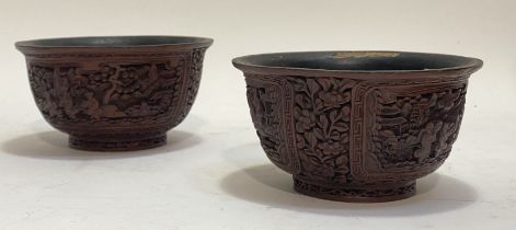 A pair of 20th century Chinese red lacquer bowls with apocryphal six character Qianlong marks verso,