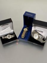 A ladys and gents matching Accurist stainless steel and gilt metal quartz wristwatches with silver