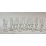 An Edwardian Pall Mall Lady Hamilton etched set of five champagne flutes (19cm), six wine glasses (
