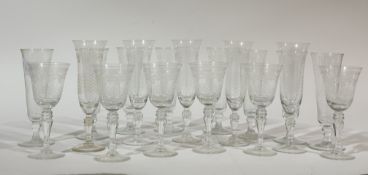 An Edwardian Pall Mall Lady Hamilton etched set of five champagne flutes (19cm), six wine glasses (