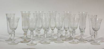 An Edwardian Pall Mall Lady Hamilton etched set of five champagne flutes (19cm), six wine glasses (