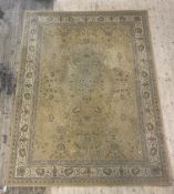 A Persian Shiraz style rug, the pale field with floral design within a guarded border 330cm x