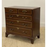 A George III mahogany chest of drawers, circa 1800, the satinwood cross banded top above two short