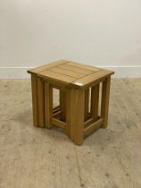 A contemporary oak nest of three tables H48cm, W51cm.