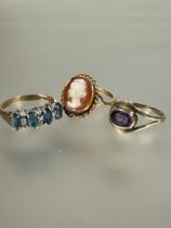 A 9ct gold cameo set ring a/f, a 9ct gold four stone gem set ring with three rows of clear stone