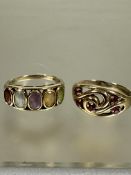 A 9ct gold multi gem set ring with oval garnet, amethyst, peridot, citrine and aquamarine, T and a