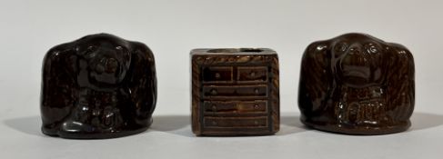 A collection 19thc Staffordshire bank or money boxes in rockingham glaze, comprising two of a