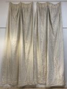 A set of four cotton lined and interlined country house curtains, embroidered with a floral