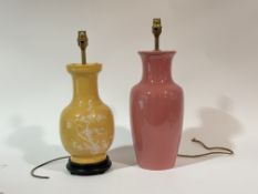 A pink ceramic baluster shaped table lamp (h-45.5cm) and a ceramic mustard coloured baluster