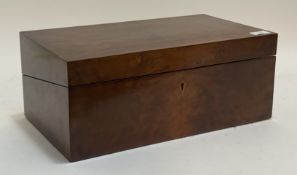 A Victorian figured walnut writing slope, the top opening to a characteristic interior inset with