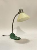 A 1940's / 1950's industrial machinists lamp, stamped Siemens, complete with glass shade. H50cm.