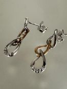 A pair of 9ct white and yellow gold chain link drop earrings set 0.025 ct of diamonds, L x 2cm 1.