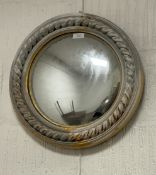 A reproduction convex wall mirror with rope twist frame D46cm.