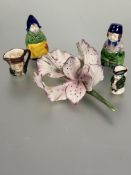 A pair of 1920s Japanese Dutch boy and girl salt and pepper figures H x 7cm, two miniature mask jugs