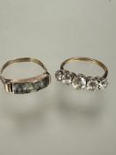 A 8ct gold dress ring set three cushion cut channel set aquamarines, stamped 333 P and a 9ct gold