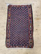 A Bessarabian / Turkish kilim, the blue ground with floral motif within a border 134cm x 78cm.