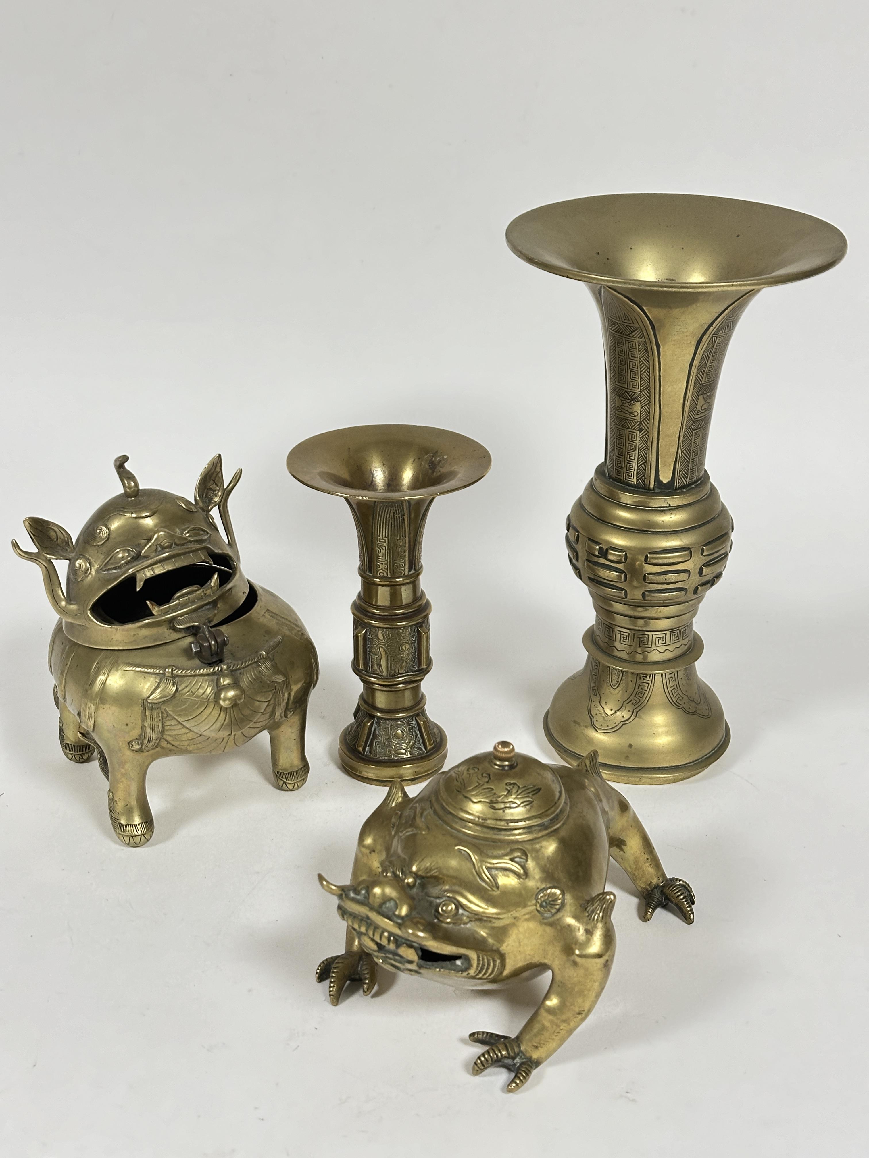 A Chines brass cast brass Fu incense burner with open mouth and hinged head  H x 20cm  D x 11cm, a