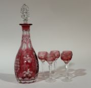 A Nachtmann Traube Bohemian Cranberry etched with vine foliage set of five long stemmed sherry