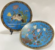 A Japanese Meiji period cloisonne enamel charger, c.1880, depicting cranes and foliage against a blu