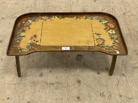 A 1930's / 1940's breakfast in bed tray or lap desk, the shaped maple veneered top hand painted with