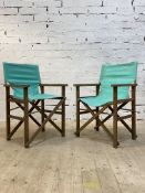 A pair of dry teak folding directors type chairs. H90cm.