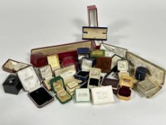 A collection of vintage jewellery boxes including ring boxes, bar brooch boxes, watch boxes etcetera