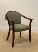A late 20th century stained hardwood desk chair, with upholstered seat and back, raised on splayed