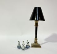 A trio of miniature 19thc Chinese gourd style blue and white ceramic vases (tallest h-7cm) and a