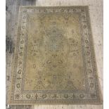 A Persian Shiraz style rug, the pale field with floral design within a guarded border 330cm x